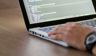 Person Using Macbook Pro