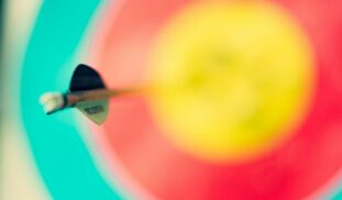 selective focus photography of an arrow