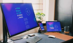 black flat screen computer monitor on gray table