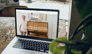 MacBook Pro on top of brown wooden table during daytime