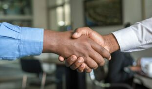two people shaking hands
