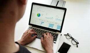 person using MacBook Pro